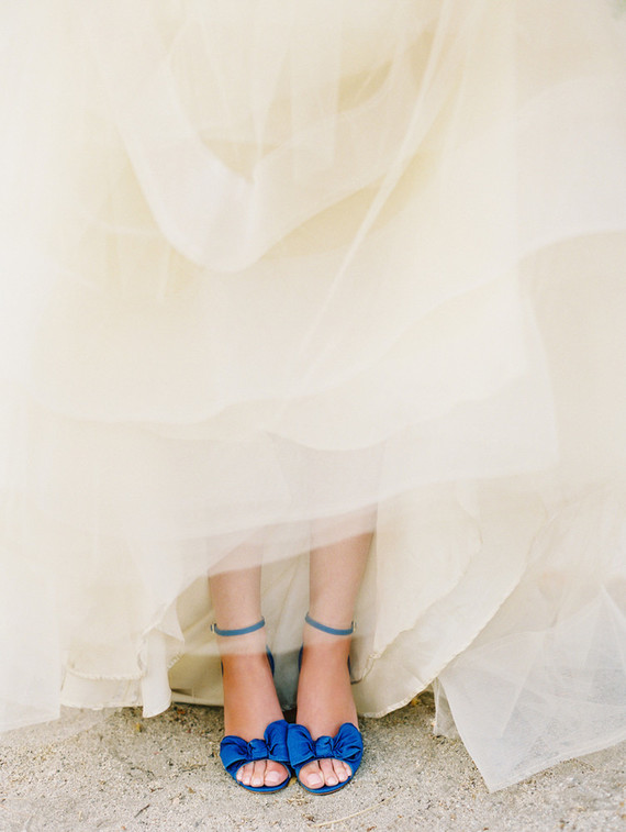 white wedding dress and Pantone classic blue color bridal sandals with bows