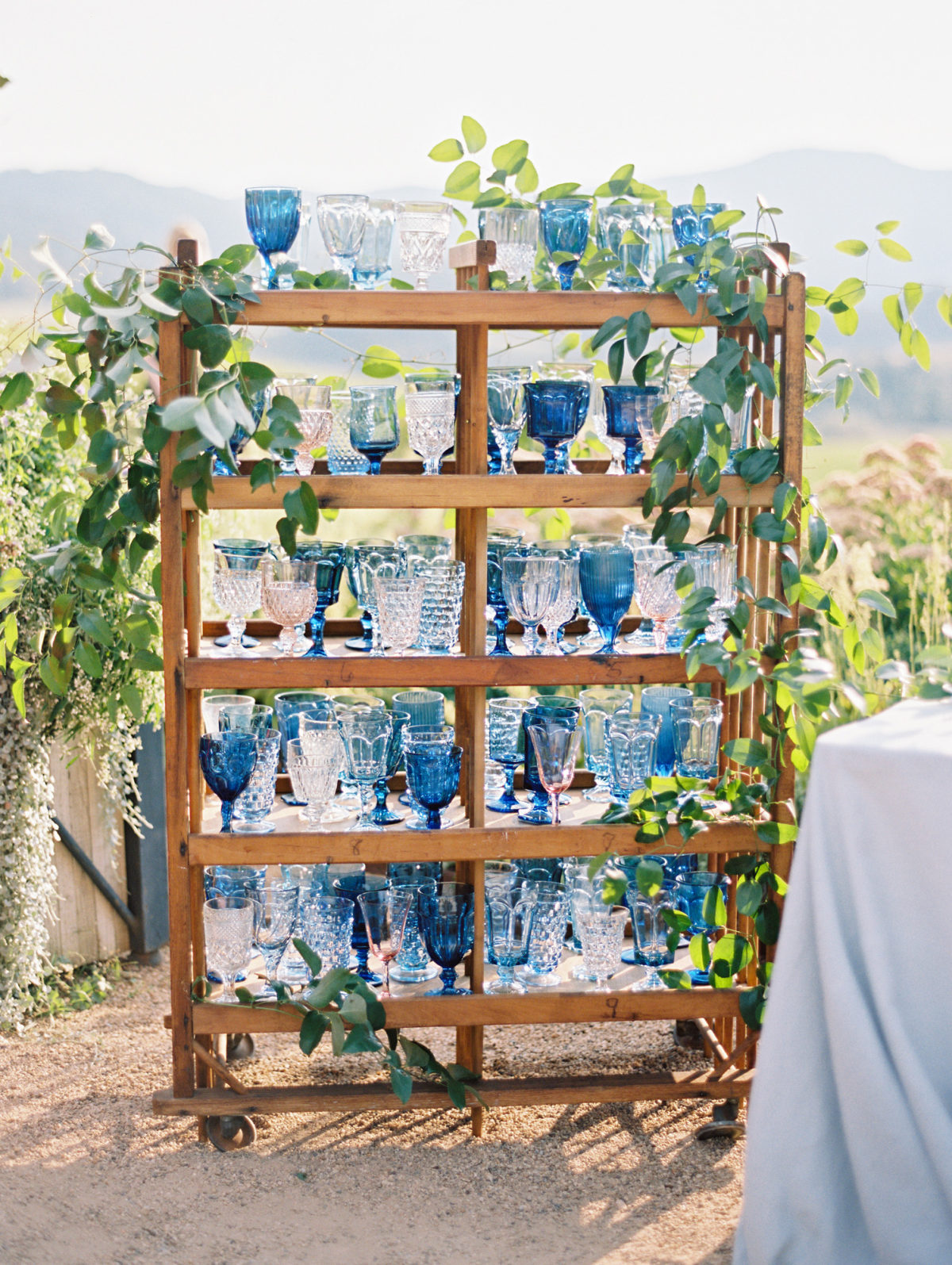 wedding ceremony decor with blue shades of glasses