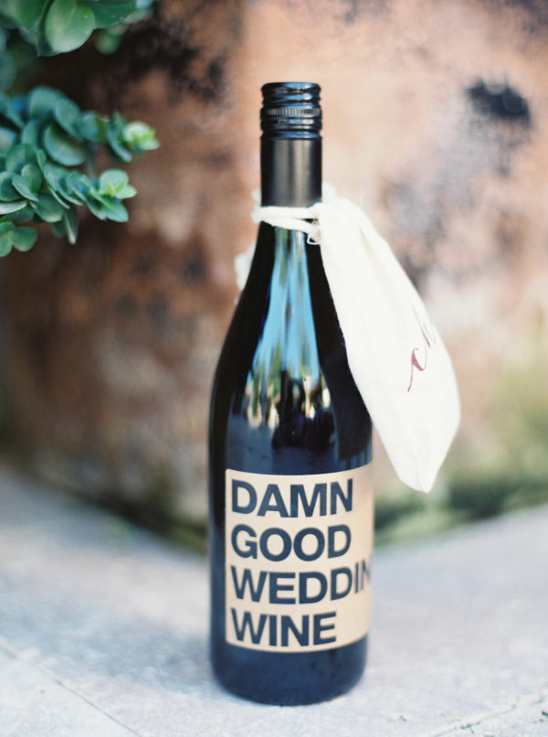 Personalized Wine Bottle with label saying "Damn Good Wedding Wine"