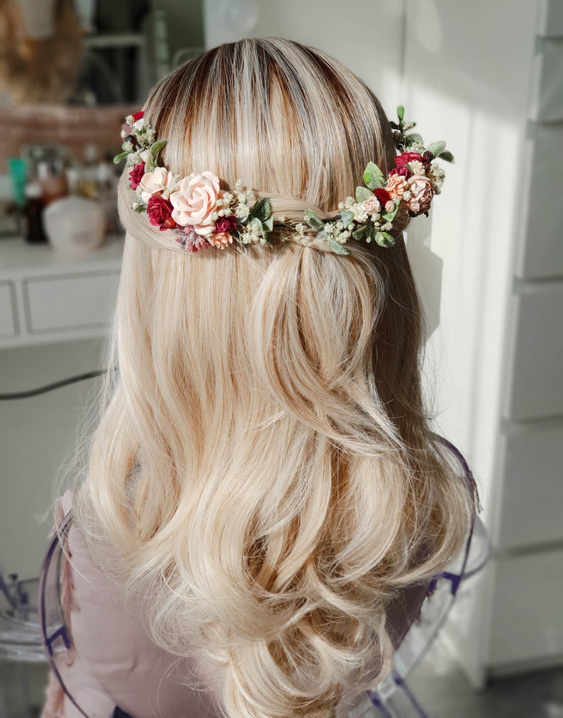 blonde bride with long hair wearing hair half up half down and delicate floral crown