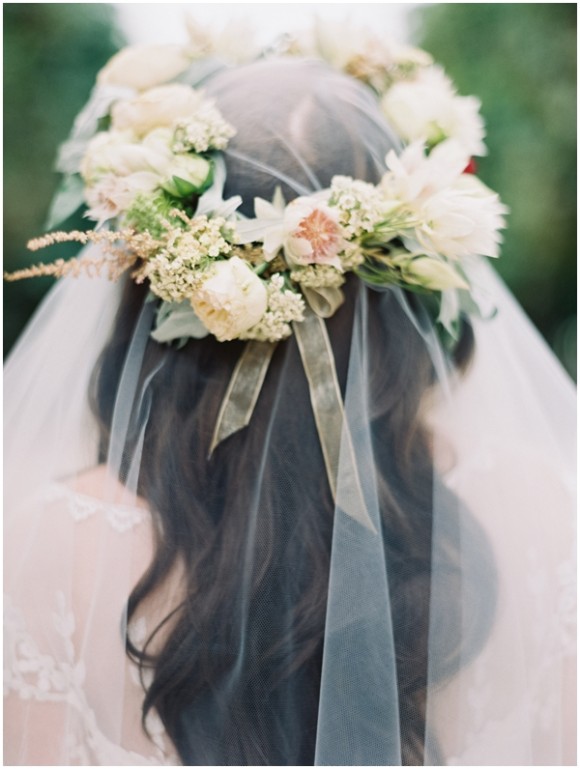 bride wearing hair down with veil and floral crown