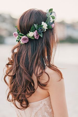 bride wearing hair down and lavender color flowers floral crown