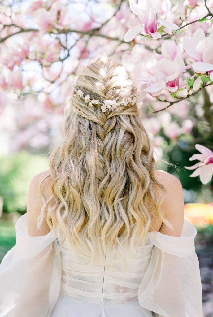 blonde half up half down bridal hair style with flowers