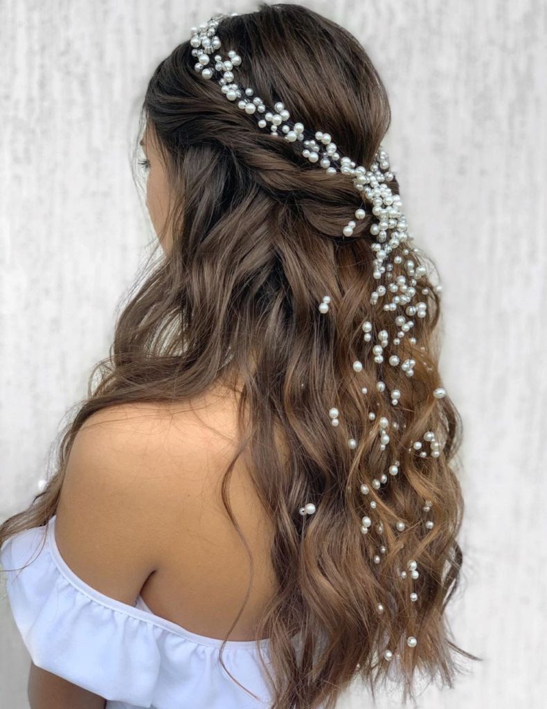 brunette half up half down bridal hair style with pearls