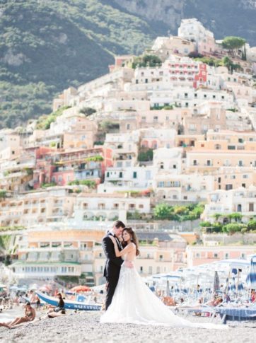 bride and groom hugging in Positano, Italy